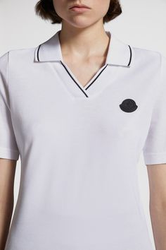 Crafted from cotton piquet, this polo shirt is featured in a slim fit. The classic style is embellished with a contrast color trim and logo patch. Designer Top With Embroidered Logo And Collared Neckline, Designer Tops With Embroidered Logo, Classic Top With Collared Neckline And Embroidered Logo, Classic Top With Embroidered Logo And Collared Neckline, Classic Collared Tops With Logo Detail, Luxury Polo Shirt With Contrast Collar, Luxury Short Sleeve Top With Striped Collar, Luxury Polo Collar Top With Embroidered Logo, Luxury Casual T-shirt With Logo Patch