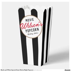 a black and white striped popcorn box with the movie wilson's popcorn logo on it