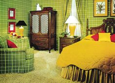 a bedroom with green walls and yellow bedding