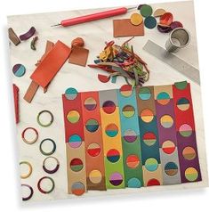 the craft supplies are laid out on the table to be used for arts and crafts