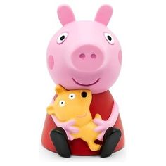 a pink pig holding a yellow starfish toy