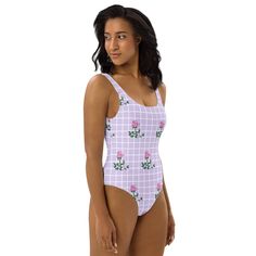 This pink rose one-piece swimsuit for all figures will bring out your best features. Enjoy the smooth fabric and the flattering design, and show it off by the sea or pool!• 82% Polyester, 18% Spandex• Fabric weight: 6.78 oz/yd² (230 g/m²), weight may vary by 5%• Chlorine-resistant fabric• Cheeky fit with a scoop neckline and a low scoop back• Zig-zag stitching• Double-layer front • Four-way stretch material stretches and recovers on the cross and lengthwise grainsThis product is made especially for you as soon as you place an order, which is why it takes us a bit longer to deliver it to you. Making products on demand instead of in bulk helps reduce overproduction, so thank you for making thoughtful purchasing decisions!• Traceability:- Knitting—China- Dyeing—China- Manufacturing—Latvia• Co Fitted Pink One-piece Swimwear For Pool, Fitted Pink One-pieces For Poolside, Fitted Pink One-piece Swimsuit For Sunbathing, Pink Fitted One Piece For Swimming, Fitted Pink One-piece For Sunbathing, Pink Fitted One-piece Swimsuit, Pink Fitted One-piece Swimwear, Fitted Pink Bodysuit For Sunbathing, Swimsuits For All