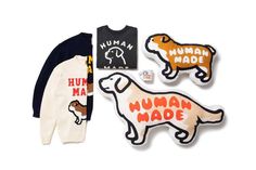 three sweaters, one with an animal and the other with human made stickers