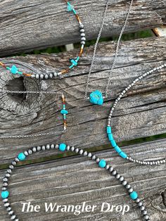 Experience the bold and iconic style of the West with The Wrangler Drop necklaces. Featuring a striking big necklace drop adorned with beautiful turquoise, these pieces brings a touch of rustic elegance to any outfit. Expertly crafted and designed to make a statement, it's the perfect addition to your jewelry collection. Option #1 with Browns and turquoise with the faux Navajo pearls is 19 inches w/extender. Option #2 Chain Bar necklace to match #1 is 19 1/2 inches w/extender. Option #3 Faux Nav Rustic Silver Jewelry For Festivals, Southwestern Necklaces For Western-themed Events, Rustic Turquoise Jewelry For Festivals, Bohemian Necklaces For Western-themed Events, Rustic Blue Jewelry For Festival, Turquoise Necklace For Western-themed Events, Handmade Turquoise Jewelry For Western-themed Events, Drop Necklaces, Navajo Pearls