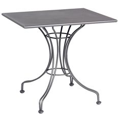 a small table with metal legs and a square top on an isolated white background,