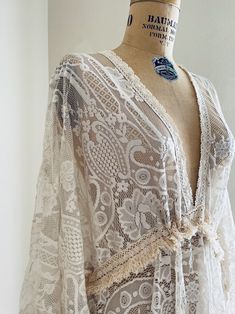 Boho Ivory Lace Wedding Dress With Fringe Maternity Wedding - Etsy Flowy Lace Patchwork Wedding Dress, Flowy Lace Patchwork Dress For Wedding, Delicate Cream Dress With Lace Details, Delicate Cream Dress With Lace, Delicate Cream Dress With Delicate Lace, Delicate Cream Lace Dress, Beige Lace Dress With Lace Sleeves, Flowy Bohemian Dress With Lace Bodice, Bohemian Flowy Dress With Lace Bodice