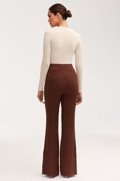 The Vanessa Diamond Knit Wide Leg Pants are the epitome of luxury and comfort. Crafted from a diamond knit structure and crafted from a cozy knit, these pants are super soft and stretchy, perfect for those days when you want to feel stylish and comfortable. With a high rise for a flattering fit, these pants are the ideal choice for any lap of luxury. Knit Wide Leg Pants, Cozy Pants, Knit Structure, Cozy Knit, Those Days, Cozy Knits, Body Measurements, Bottoms Pants, Leg Pants