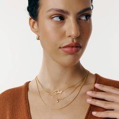 Size Guide Safety Policy Care InstructionsIntroducing our Effortless Elegance Set, curated for those who embrace understated luxury.The Belle Name Necklace exudes charm, complemented by the classic ROPE Chain for a touch of sophistication. Elevating the ensemble is a Paperclip Chain adorned with 0.1 ct diamond, adding a subtle sparkle to your everyday look.Effortless Elegance Set;Set with 3 necklacesBelle Name Necklace: Personalized Name Necklace, up to 10 characters.Material: Gold VermeilChain Safety Policy, Traditional Diamond, Make Jewelry, Understated Luxury, Anniversary Jewelry, Mom Jewelry, Initial Ring, Initial Bracelet, Initial Jewelry