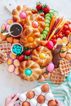 an assortment of food is displayed on a table