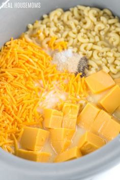 the ingredients for macaroni and cheese are mixed together in a slow cooker