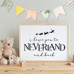 a teddy bear sitting next to a sign that says, i have you a neverland and back