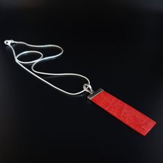 Mens silver chain pendant necklace Red Coral gemstone, Handmade jewelry for men, Unique gifts for men Gnatus all-stone Pendant with natural red Coral and sterling silver hook. The unique long rectangle shape and the natural red/orange color, adds a unique mat spark and gives a modern touch to this pendant. It is thoughtfully set into 925 Sterling silver and a 10mm hook is placed on the upper part of the pendant for perfect balance. Modern design for Men and perfect gift for him. The Pendant feat Red Minimalist Pendant Necklace, Minimalist Red Pendant Necklace, Handmade Red Necklace With Rectangular Pendant, Mens Pendant Necklace, Silver Chain Pendant, Mens Necklace Pendant, Silver Chain For Men, Coral Gemstone, Unique Gifts For Men