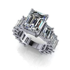 8.26 ctw graduated emerald cut anniversary or engagement ring. Solid 925 Silver(1) 10x8mm, 3.50 ct emerald cut Colorless Simulated Diamonds.(2) 6x4mm, emerald cut Colorless Simulated Diamonds, 1.16 ctw(12) 5x3mm, emerald cut Colorless Simulated Diamonds, 3.60 ctw*8.26 carat total weight.*Sterling Silver is Rhodium dipped to reduce tarnishing. Rhodium is a very strong metal that creates a protective layer over the sterling silver, making it more resistant to tarnishing. 📏Order a free ring sizer Eternity Engagement Ring, Gold Anniversary Rings, Emerald Cut Engagement, Simulated Diamond Rings, Emerald Engagement Ring Cut, Luxury Rings, Engagement Ring Cuts, Moissanite Ring, Moissanite Rings