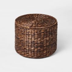 an empty wicker basket on a white background