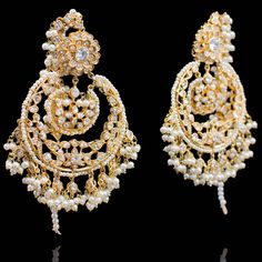 Blending the old world charm with the grace of a modern bride! These statement heritage earrings feature layers of CZ stones bonded together by delicately carved pearl beads. Approximate earrings length is 4". Gold-plated on high-quality brass as base metal. Made by order. Kindly allow 4-6 weeks for the delivery of this item. For custom or urgent requests, please contact support@alacouture.com. *Please Note: We use faux stones and beads in all of our jewelry. Carved Pearl, Unique Gift Cards, Create Words, Faux Stone, Traditional Attire, Old World Charm, Modern Bride, Cz Stone, Free Giveaway