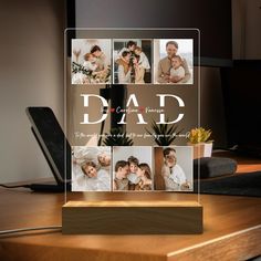 a glass block with the words dad on it and four pictures of people in them