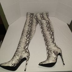 Nwot These Gorgeous Statement Thigh High Boots Are In “Natural Snake” With 4” Heel And Pointed Toe & Zipper On Inside. Size 6m 4” Heel 17” Shaft Circumference 24” Shaft Height Stiletto Heel Materials Are Pictured. Does Not Come In Original Box Reposhing This Item I Purchased From @Melinda2931. Loved It, But Ready To Rotate For Something New. Questions? Leave A Comment Below! Fitted Cream Knee-high Boots For Fall, Fitted Cream Knee-high Heeled Boots, Chic Cream Fitted Knee-high Boots, Chic Fitted Cream Knee-high Boots, Fitted Thigh-high Beige Boots, Fitted Beige Thigh-high Boots, Fitted Cream Heeled Boots For Party, Cream High Heeled Boots, Fitted Cream High Heel Boots