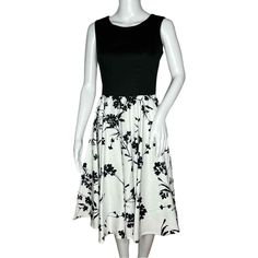 Grace Karin Dress Womens Small Black White Floral Fit & Flare Retro Tea Dress Women’s Size Small Boatneck Sleeveless Vintage Style Tea Dress Midi Length V-Back Hidden Back Zip Cotton Spandex Blend Stretch Classic Preppy Wedding Guest Party Tea Party Afternoon Tea Garden Party Neutral Floralcore Bloomcore Flowercore Measurements Are Approximate: Length 40” Armpit To Armpit 17” Waist 28” New With Tag (1842) Black And White Sleeveless Midi Dress For Summer, Black And White Knee-length Summer Dresses, Casual Black And White Dress For Spring, Casual Black And White Spring Dress, Black And White A-line Spring Dress, Elegant Black And White Midi Dress For Spring, Black And White A-line Summer Dress, Black And White Midi Dress For Spring, Black And White Midi Dress For Summer Evenings