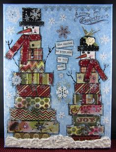 two snowmen standing on top of stacked boxes in front of the words merry christmas