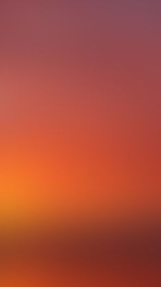 an airplane flying in the sky at sunset or sunrise with orange and red hues