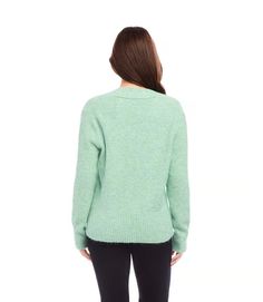 Experience luxury and style with our wrap sweater. The broad cuffs and hem lend an elegant flair, and the ribbed detailing provides texture. Its faux wrap design offers a chic and refined appearance, making it ideal for both casual and formal events. Color- Seaglass. (Light green). Crossover V-Neck. Set-in sleeves. Ribbed cuff and hem. Faux wrapped. Length: 24 inches (size M). Fabric - 53% Recycled Polyester. 39% Acrylic. 5% Wool. 3% Spandex. Care- Dry clean. Jumpsuit And Blazer, Karen Kane, Short Sleeve Cardigan, Curvy Dress, Wide Cuff, Wrap Sweater, Blazer Coat, Formal Occasion, Denim Pants