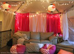 a living room filled with furniture and lights