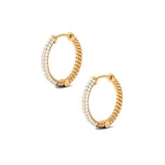 Product Details These hoop earrings are simply amazing, embellished with round cut diamonds that are beautifully set in a prong setting. The minimalistic design of these earrings adds to their beauty, making them a versatile accessory that can be worn with any outfit. Crafted from solid gold metal, these hoop earrings are a luxurious addition to any jewelry collection. Their exceptional design and use of high-quality materials make them a truly remarkable piece of jewelry. These earrings are sur Diamond Hoop Earrings, Minimalistic Design, Quality Diamonds, Round Cut Diamond, Brilliant Cut Diamond, Round Diamond, Prong Setting, Hinges, Round Diamonds