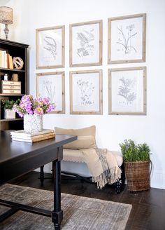 a living room with pictures on the wall and text overlay that reads how to create a gallery wall using art prints