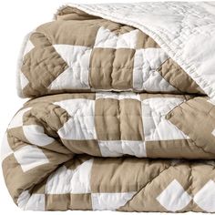 the comforter is tan and white with checkered design on it's sides