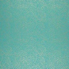 a blue and white wallpaper with small circles on the top, in various sizes