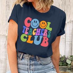 Cool Teachers Club, Cool Teachers Club, Teacher Shirt, Retro Teacher T-ShirtMade from airy fabric, can be worn all year around, good sweat absorbing, wear at home, good sleepwear or any sports activities. Great as Birthday gifts, any Holiday presents for loved ones or It's a gift to yourself. This adorable item can be designed upon anyone's wish with any title.All items are made to order. * Please be aware that the physical product's colors may differ slightly from the mockup. Brand: Gildan Clas Silhouette Cameo Vinyl, Holiday Presents, Orange Texas, Teacher Teacher, Dark Grey Color, Home Good, Personalized Clothes, Teacher Tshirts, Sports Activities