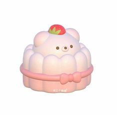 an inflatable toy with a strawberry on top