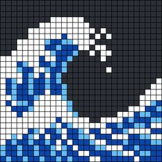 a cross stitch pattern with blue and white waves