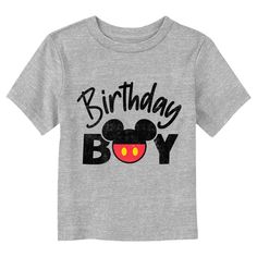 Who knew that dressing "mousey" could be so cute!? Celebrate Walt Disney's most iconic character with this officially licensed Disney Mickey Mouse and Friends Birthday Boy Mousey Silhouette Toddlers' Graphic T-shirt! This unique tee reads: "Birthday Boy" in slightly distressed black letters with a Mickey logo replacing the letter "O." Grab some new Mickey and Friends apparel for the youngest members of the family and make their next trip to the Disney parks a memorable one! Mickey Mouse And Friends Birthday, Mickey Logo, Mickey Mouse Birthday Shirt, Trending Graphic Tees, Mickey Mouse Shorts, Mickey Mouse Birthday, Friends Birthday, Mickey Mouse And Friends, Toddler Boy Outfits