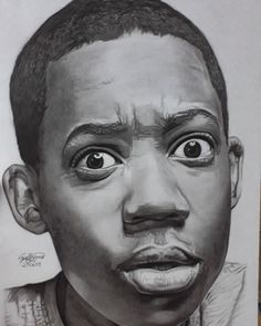 a pencil drawing of a young man's face with an intense look on his face