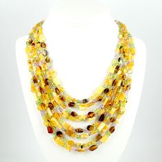 Polish Art Center - "Amber Blend" Artistic Necklace - 18" - 6 Strand Luxury Multicolor Single Strand Necklace, Luxury Multicolor Single Strand Necklaces, Elegant Multi-strand Amber Necklace, Luxury Multi-strand Necklace For Gift, Elegant Multicolor Multi-strand Necklace, Luxury Multi-strand Gemstone Beads Necklace, Multi-strand Gemstone Beads Costume Necklace, Elegant Amber Jewelry With Polished Beads, Elegant Amber Crystal Necklaces With Polished Beads