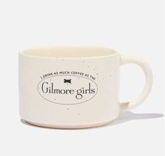 a white coffee mug with the words, drink as much coffee as the gilmore girls