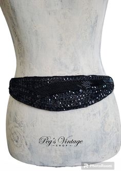 "Vintage Black Sequin & Glass Beaded Belt Twilight Collection Vintage black satin sequin glass beaded belt. Sequin/beads on satin with elastic stretch strings. Excellent condition.  C Hook Latch  Measures approx. 30\"Long - Best Fit 28\" - 32\" Waist , Center width 2 1/2\"  1980s vintage hand made fashion  Vintage sizes vary from today sizing. It is best to check the measurements carefully with those of a similar item of your clothing for the most accurate idea of fit FREE US Shipping $35 and ov Twilight Collection, Beaded Belt, Sequin Beading, Pink Beads, Rhinestone Bracelet, Fashion Vintage, 1980s Vintage, Black Sequins, Beaded Chain