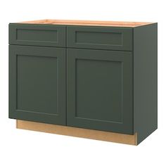 a green cabinet with two doors and one drawer on the bottom, in front of a white background