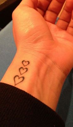 a person with a small tattoo on their wrist that says, 100 ideas about sister tattoos on pinterest