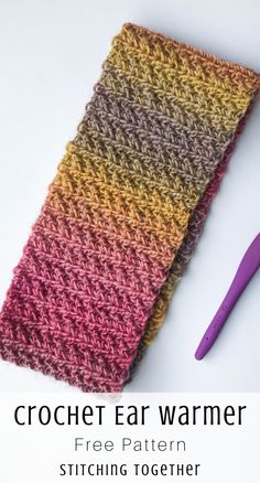 the crochet ear warmer is made with two different colors and has a purple knitting needle