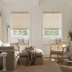 a living room filled with furniture and two windows covered in blind shades on the windows