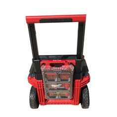 a red and black utility cart with wheels