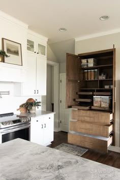 the kitchen is clean and ready to be used as a storage area for food items