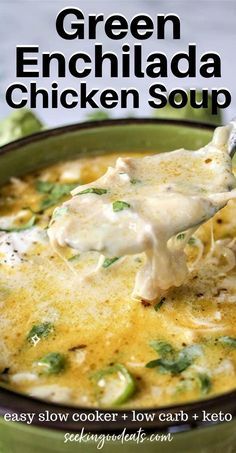 green enchilada chicken soup in a bowl with a spoon scooping out