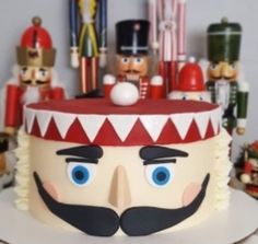 there is a cake decorated with nutcrackers and soldiers