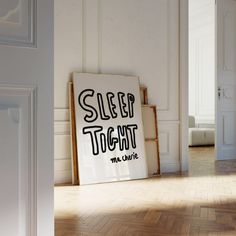 there is a sign that says sleep tight on the floor