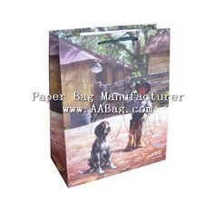 a paper bag with a painting of two dogs on it