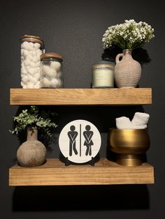 two wooden shelves with various items on them