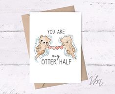 a card with two bears holding hands and the words you are my otter half